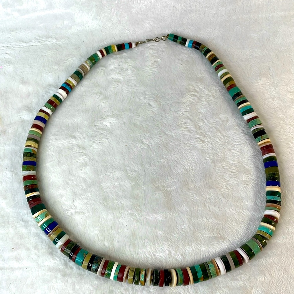 Heshi necklace made with lapis, turquoise, mother of pearl, shell.